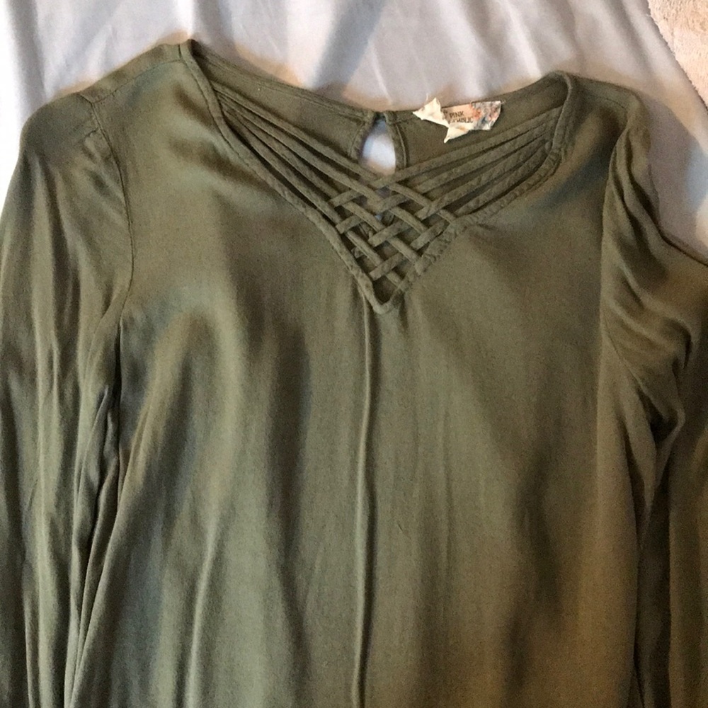 Long sleeve silk shirt with “bell bottom” sleeves.